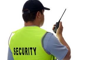 Security guard using two way radio